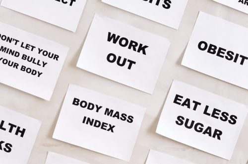 Flat lay of motivational health quotes on paper, promoting healthy habits and self-care.